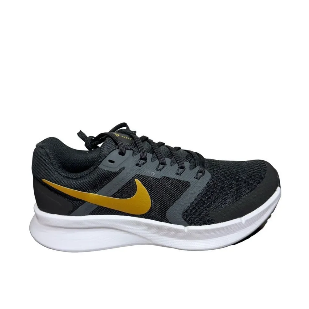 Nike women’s Black and Gold Running Shoes size 6.5